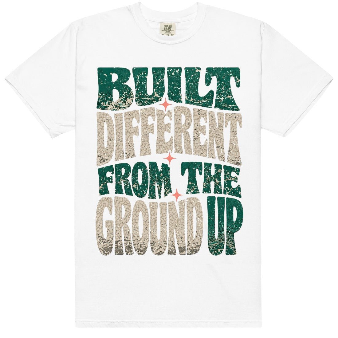 White HeatLit ‘Built Different From The Ground Up’ tee with a Birds of Paradise front graphic — teal green, cream elephant print and coral accents.